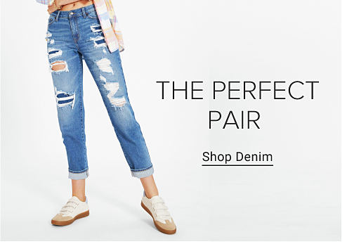 Pair of ripped jeans. The perfect pair. Shop denim