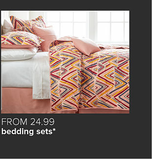 Orange and red zig zag patterned bedding. From $24.99 bedding sets.
