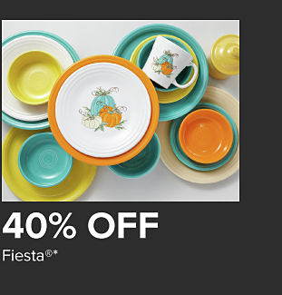 Assortment of colorful plates, bowls and mugs. 40% off Fiesta.
