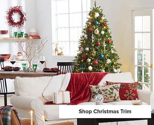 Image of a living room decorated for Christmas. Shop Christmas trim.