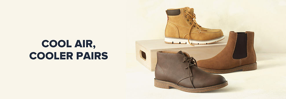 Three pairs of mens' boots. Cool air, cooler pairs. 