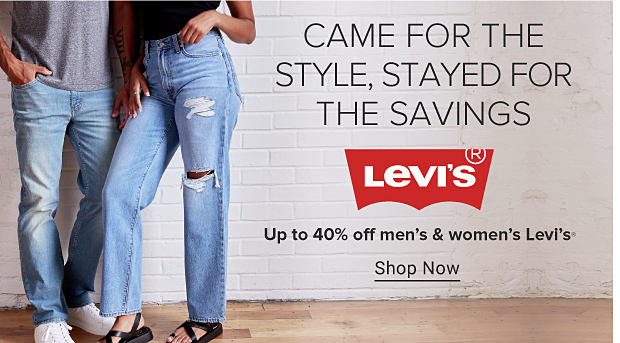 A man and a woman wearing Levi's jeans and tee shirts. Came for the style, stayed for the savings. The Levi's logo. Up to 40% off men's and women's Levi's. Shop now.