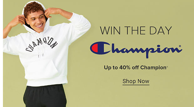 Image of man in Champion hoodie WIN THE DAY up to 40% off Champion Shop Now