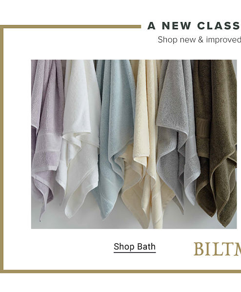 Hanging towels in white, blue, yellow, gray and brown. Shop bath.