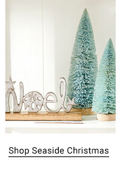 Image of noel and tree decor. Shop Seaside Christmas.