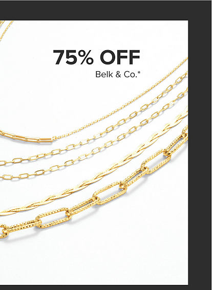 Stack of dainty gold necklaces is varying styles. 75% off Belk and Co. 