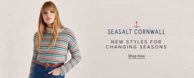 A woman in a striped sweater. Seasalt Cornwall. New styles for changing seasons. Shop now.