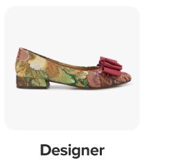 A multicolored designer shoe. Shop designer.