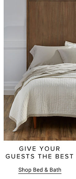 Image of bed with white bedding GIVE YOUR GUESTS THE BEST Shop Bed & Bath