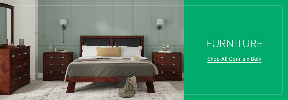 A bedroom with a bed and a night stand. Furniture. Shop all Conn's x Belk