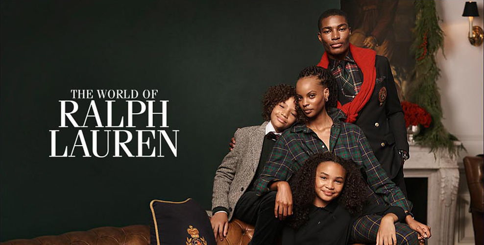 The world of Ralph Lauren. An image of a man wearing a blazer, a boy wearing a gray sport coat, a woman in plaid pajamas and a girl in a black shirt.
