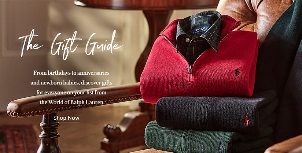 An image of quarter zip sweaters and a plaid button down shirt stacked on a chair. The gift guide. From birthdays to anniversaries and newborn babies, discover gifts for everyone on your list from the World of Ralph Lauren. Shop Now.