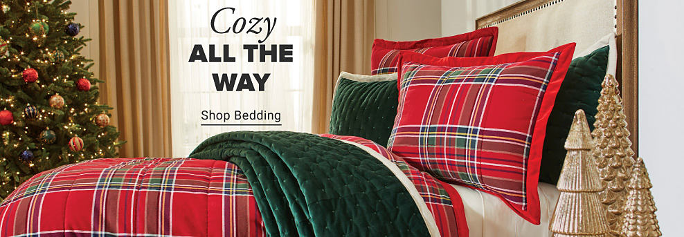 Image of holiday bedding. Cozy all the way. Shop bedding. 