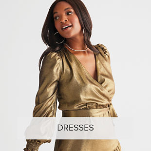 Image of woman in dress. Shop dresses. 