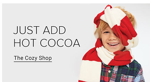 Kid wrapped in a red and white scarf. Just add hot cocoa. The cozy shop