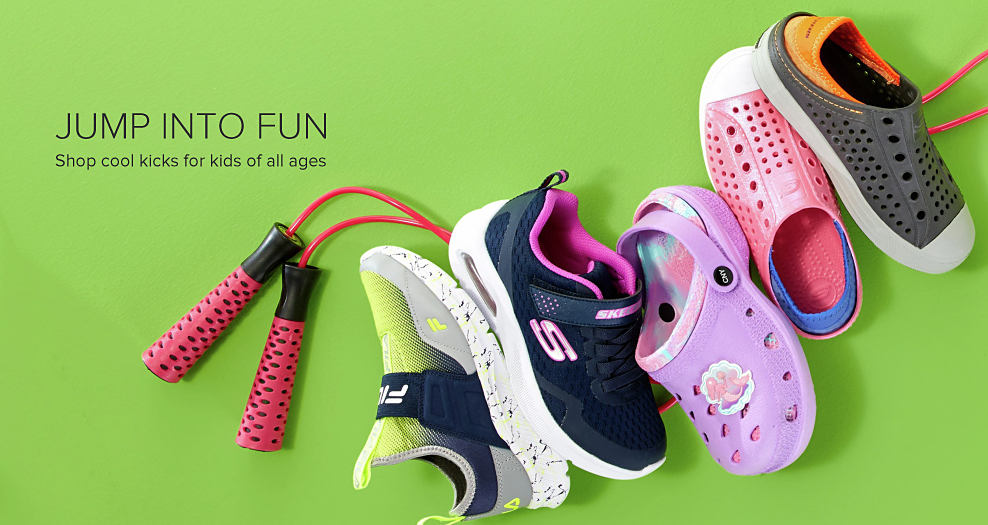 A variety of bright kids' shoes with a jump rope. Jump into fun. Shop cool kicks for kids of all ages. Shop now. 