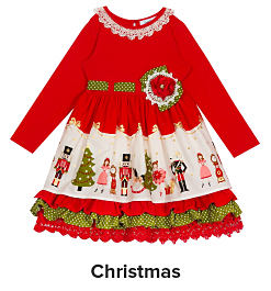 A red Christmas dress with nutcrackers on it. Shop Christmas. 