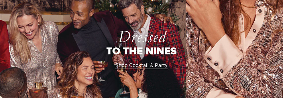 An image of a variety of people at a holiday party wearing dress clothes. Dressed to the nines. Shop cocktail and party. 