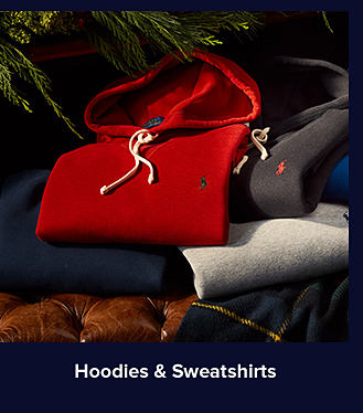 An image of a stack of solid-colored Polo hoodies. Shop hoodies and sweaters.