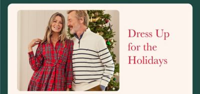 An image of a couple wearing holiday apparel. Dress up for the holidays.