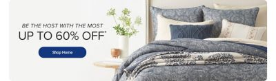 Be the host with the most. Up to 60% off. Shop home. A bed with blue patterned bedding.