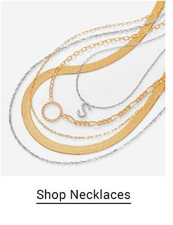 An image of five gold and silver necklaces. Shop necklaces.