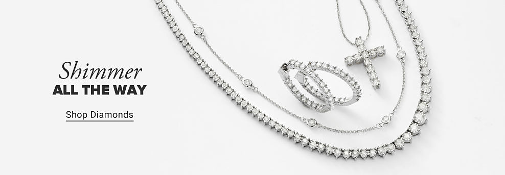 Shimmer all the way. An image of diamond jewelry. Shop diamonds.