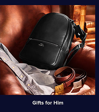 An image of a black leather backpack, a brown leather belt, and a button-down shirt. Shop gifts for him.