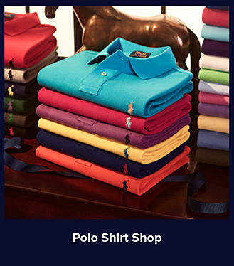 An image of a stack of multi-colored polo shirts. Shop Polo Shirt Shop.