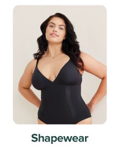 Image of a woman wearing a black bodysuit. Shapewear.