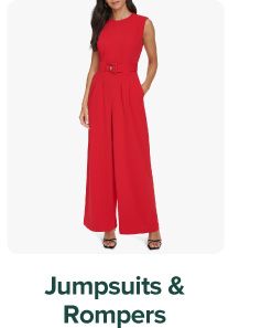 Woman wearing a red jumpsuit. Jumpsuits and rompers.