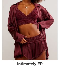 An image of a woman wearing a three piece pajama set. Intimately FP.