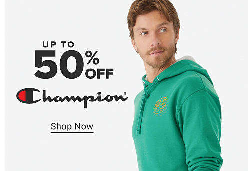Up to 40% off Champion. Shop now. A man in a red Champion hoodie.