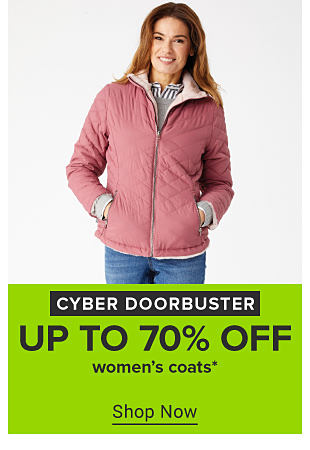 An image of a woman in a pink coat. Cyber doorbuster. Up to 60% off women's coats. 