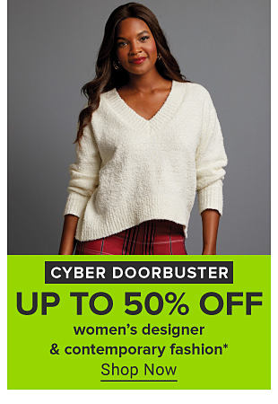 An image of a woman in a white v-cut sweater. Cyber doorbuster. Up to 50% off women's designer and contemporary fashion. Shop now. 