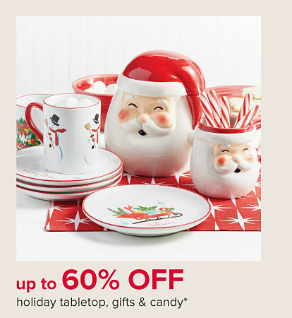 Santa containers, a snowman mug and holiday plates. 60% off holiday tabletop, gifts & candy 