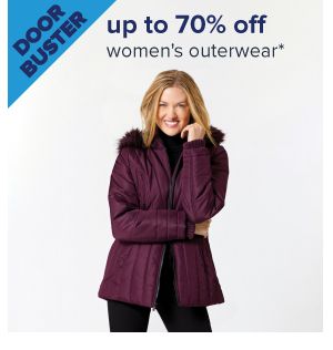 Doorbuster. Up to 60% off women's outerwear. Image of a woman wearing a coat. Shop now.