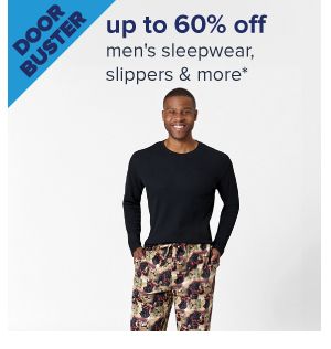 Doorbuster. Up to 60% off men's sleepwear, slippers & more. Image of a man wearing pajamas.