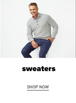 A man in a gray sweater and blue pants. Sweaters, shop now.