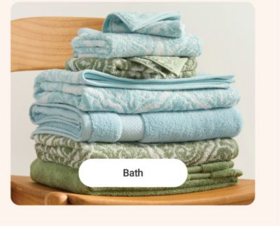 Various blue and green bath towels. Shop bath.