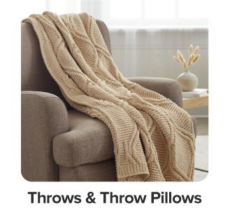 A brown throw blanket. Shop throws and throw pillows.