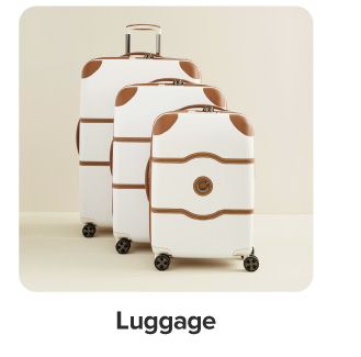 Various white suitcases. Shop luggage.