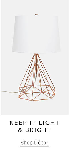 An image of a lamp with a geometric frame design. Keep it light and bright. Shop decor.