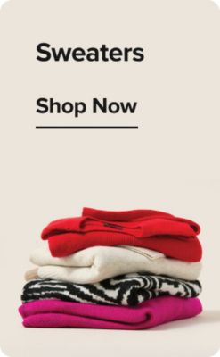 Denim. Shop now. A stack of jeans.