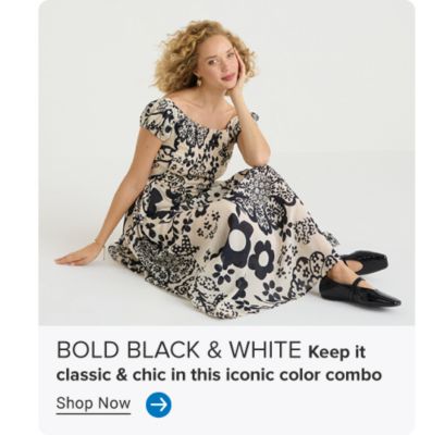 Image of model sitting in black and white floral dress. BOLD BLACK & WHITE. Keep it classic & chic in this iconic color combo. Shop Now. Arrow icon