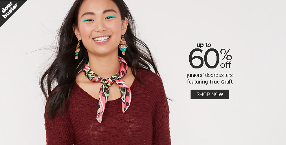 A young woman in a burgundy sweater with a colorful scarf and gold and tourqoise earrings. Doorbuster. Up to 60% off juniors' doorbusters featuring True Craft. Shop now. 