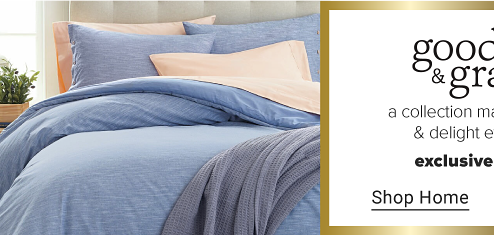 A bed with a blue comforter, blue and pink pillows and a blue throw blanket. Goodness and grace, a collection made to pamper and delight every sense. Exclusively at Belk. Shop Home. Two scented candles