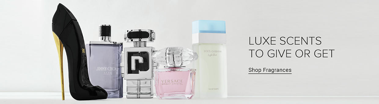 Image of fragrance bottles. Luxe scents to give or get. Shop Fragrances