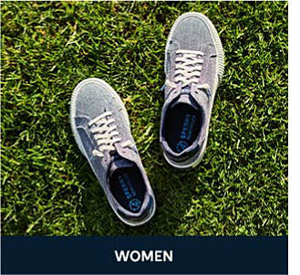 Image of Sperry sneakers in the grass. Shop women.