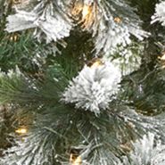 9-Foot Flocked Oregon Pine Artificial Christmas Tree with 600 Clear Lights and 1580 Bendable Branches